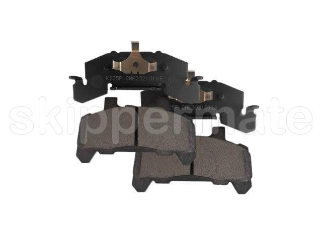 Photo of 4 Universal Brake Pads showing fronts and backs