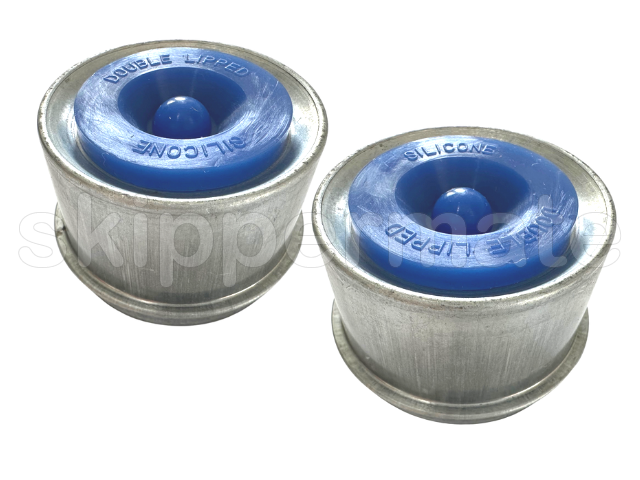 Shot of a pair of Dust Caps from top and side showing rubber black inserts